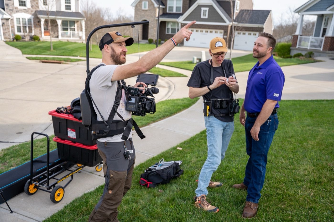 Blocking a New Heights Roofing scene in a suburban driveway