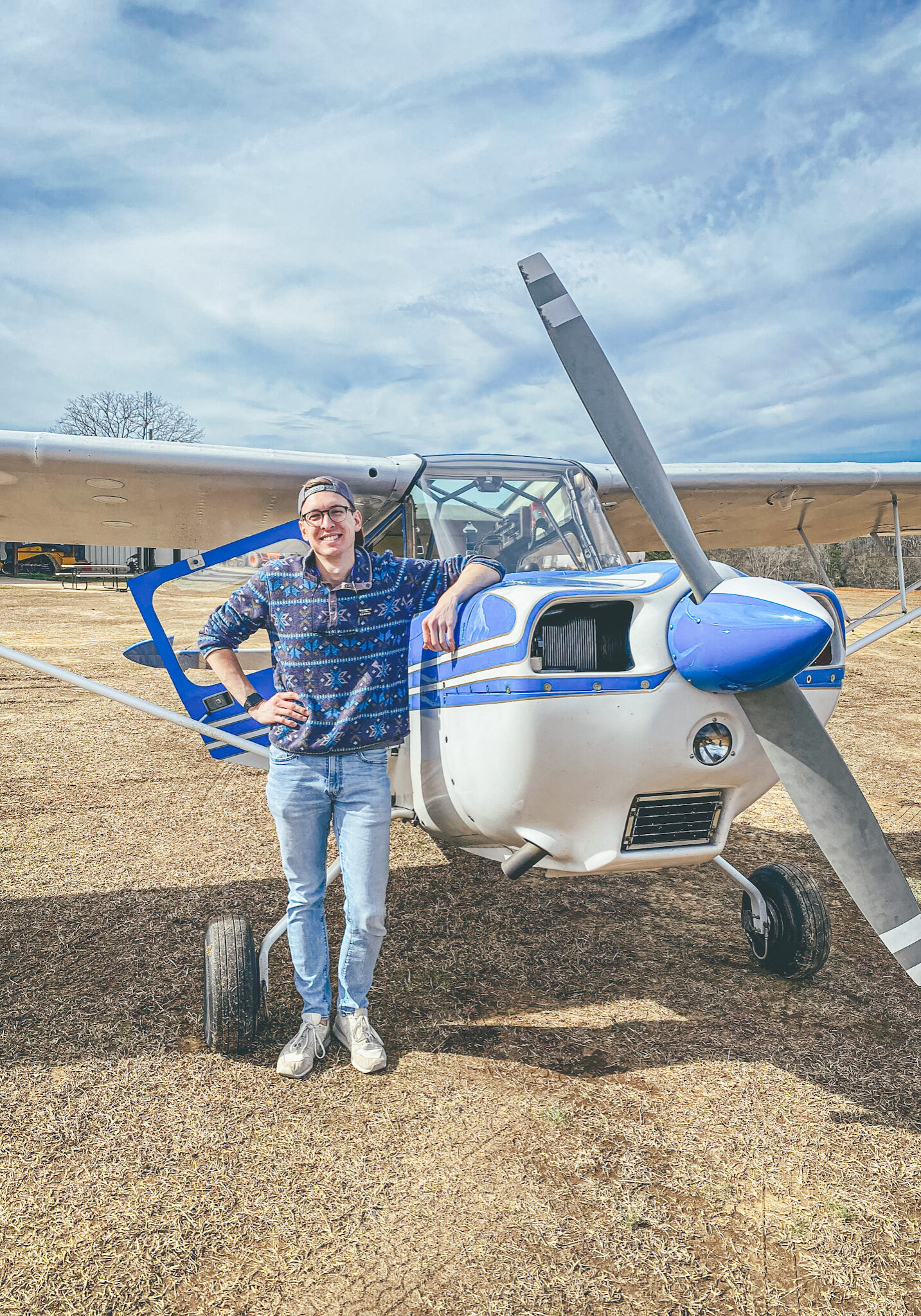 Ian Hoyt standing in front of a Cessna aircraft