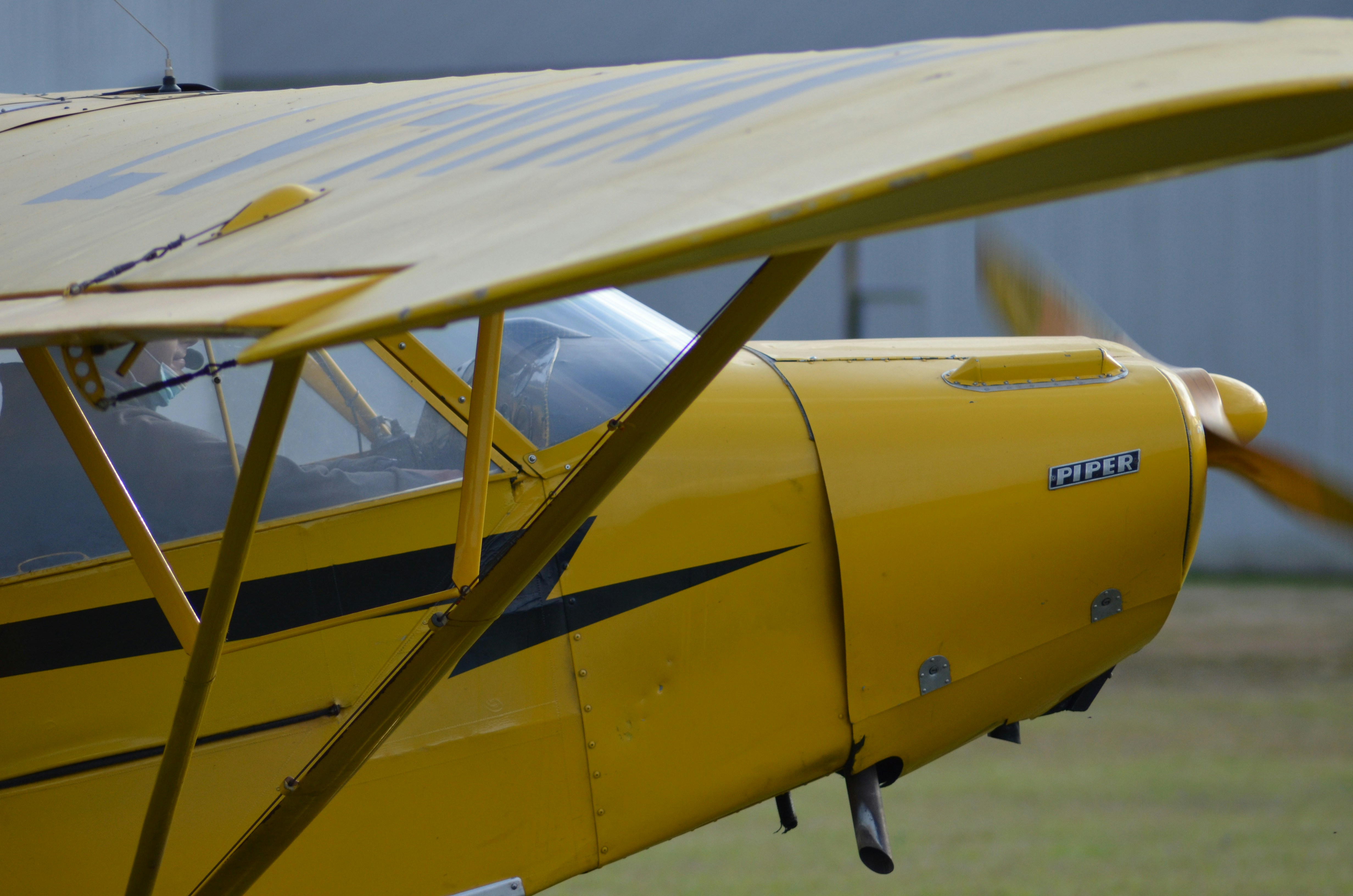 A small aircraft parked on a runway